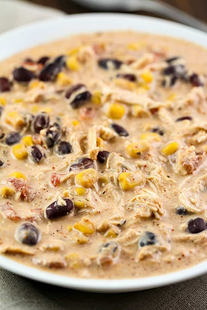 Fantastic and easy Crock Pot Cream Cheese Chicken Chili recipe! My family's favorite creamy chili!