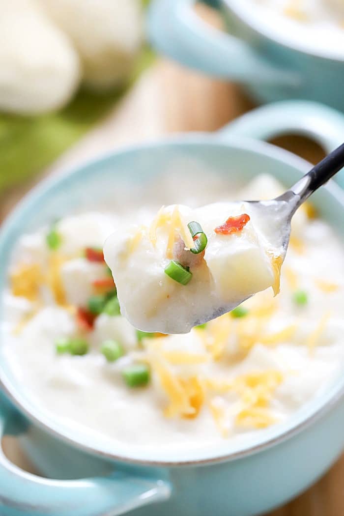 You've gotta try this Easy Cheesy Potato Soup Recipe! It's crazy delicious and only uses one pot! Very little prep time needed and is so easy to make!