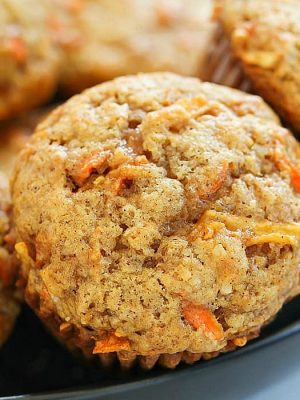 Apple Carrot Muffins (also known as Sunshine Muffins) are soft muffins filled with carrots, apples, coconut, cinnamon & nutmeg. They bake up in no time and will be a crowd pleaser!