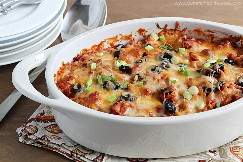 Love enchiladas but hate filling and rolling up all those tortillas? This Enchilada Casserole is all the yummy, cheesy goodness of enchiladas but in an easy casserole form! Love enchiladas but hate filling and rolling up all those tortillas? This Enchilada Casserole is all the yummy, cheesy goodness of enchiladas but in an easy casserole form!