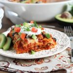 Love enchiladas but hate filling and rolling up all those tortillas? This Enchilada Casserole is all the yummy, cheesy goodness of enchiladas but in an easy casserole form!