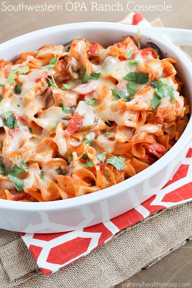 A delicious casserole with chicken, mushrooms, tomatoes and egg noodles tossed in a flavorful sauce made using enchilada sauce and OPA Greek Yogurt Ranch Dressing. Best casserole EVER! A delicious casserole with chicken, mushrooms, tomatoes and egg noodles tossed in a flavorful sauce made using enchilada sauce and OPA Greek Yogurt Ranch Dressing. Best casserole EVER!