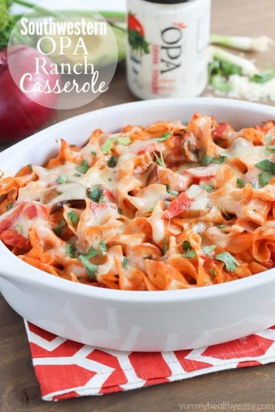 A delicious casserole with chicken, mushrooms, tomatoes and egg noodles tossed in a flavorful sauce made using enchilada sauce and OPA Greek Yogurt Ranch Dressing. Best casserole EVER!