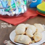 Simple & delicious Pizza Rolls made from ready-made pizza dough, mozzarella sticks, pizza sauce and pepperoni all rolled together in a fun little bite and served with a refreshing Capri Sun! #ad