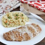 Pecan crusted chicken breasts cooked in a skillet, then topped with an apple cream sauce. Unique, unbelievably delicious & so easy!
