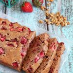 Strawberry Walnut Bread - a delicious quick bread filled with fresh strawberries and walnuts. Easy, light and flavorful! yummyhealthyeasy.com