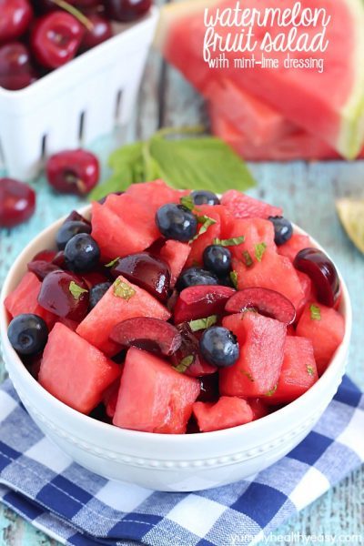 Watermelon Fruit Salad with cherries, blueberries and a delicious mint-lime dressing. Easy, fresh and the perfect summer side dish!
