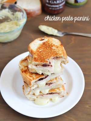 Chicken Pesto Panini on a white plate.