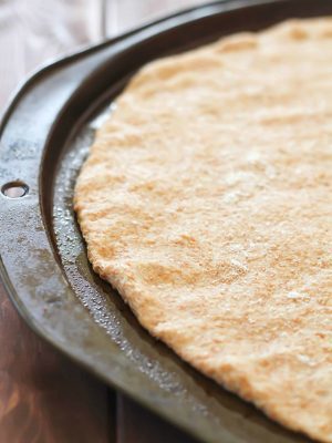 Crazy easy Whole Wheat Pizza Dough - no rising needed! Quick, healthy and delicious crust for your favorite pizza!