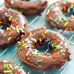 Delicious Baked Chocolate Cake Donuts that are soft, chocolatey and light with the best chocolate glaze on the top. And of course, sprinkles too. :) #CAdairy #ad