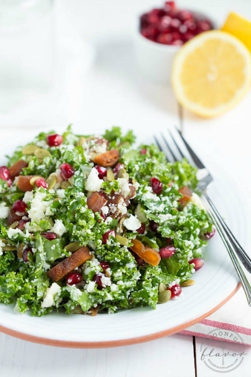 Cauliflower Kale Salad with Pomegranate, Dried Apricots & Pumpkin Seeds by Spoonful of Flavor
