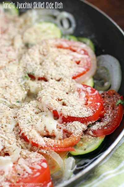 No better way to use up that summer zucchini than in a healthy and easy side dish! This Tomato Zucchini Skillet is made in one pan and kicks the pants off those frozen veggie side dishes!