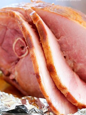 The juiciest, most tender Brown Sugar Glazed Ham ever and it's SO easy! Only a few simple ingredients to an incredible ham that will be a hit at your next holiday party!