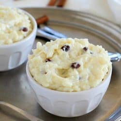 This delicious and creamy Eggnog Rice Pudding recipe will have you ready for the holidays! The textures in this rice pudding will wow your tastebuds. The rice is tender, the raisins are chewy and the pudding part is so creamy. Add in eggnog flavor and it's like heaven in your mouth. #AD