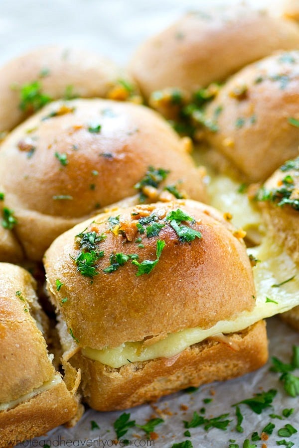 You will fall head-over-heels for these monte cristo-stuffed cheesy sliders! They're simple to throw together at a moment’s notice and unbelievably fun to eat!