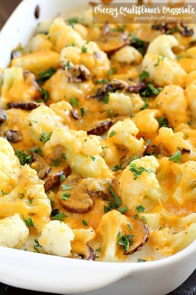 Cheesy Cauliflower Casserole makes the most delicious side dish or meatless main dish! Full of flavor with cauliflower, sautéed mushrooms & leeks, and an easy cheesy sauce that won't pack on the calories. This is incredible! AD