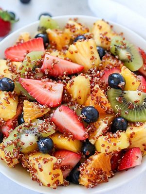 Quinoa Fruit Salad tossed in a Sweet Lime Dressing - a colorful, healthy side dish that goes with any meal! AD