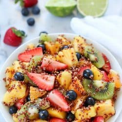 Quinoa Fruit Salad tossed in a Sweet Lime Dressing - a colorful, healthy side dish that goes with any meal! AD