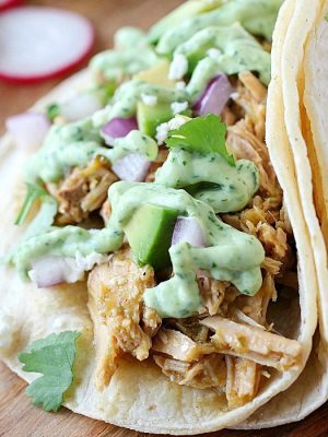 Pork Verde Taco on a cutting board.