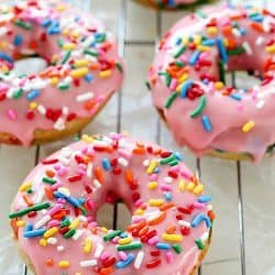Baked Funfetti Donuts aka Birthday Donuts! These homemade donuts are made with healthier ingredients and baked. Topped with an easy glaze and funfetti sprinkles! Every bite has funfetti sprinkles!