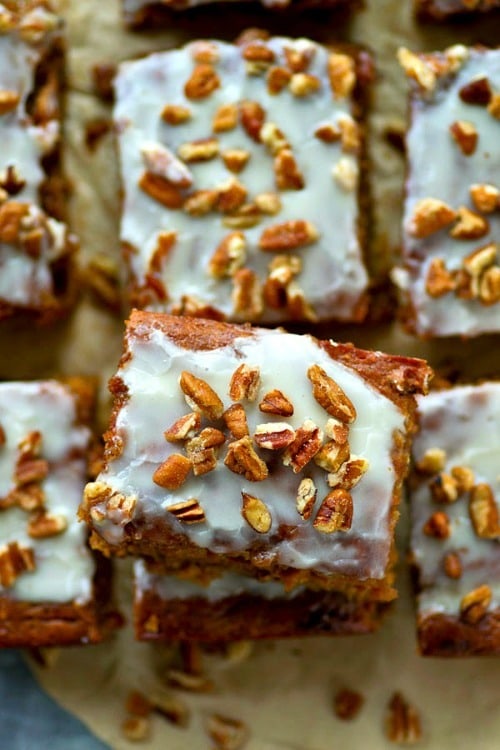 Unbelievably soft inside, loaded with pecans, and covered with tons of vanilla glaze, this lighter banana pecan snack cake is nearly impossible to stop eating once you start!