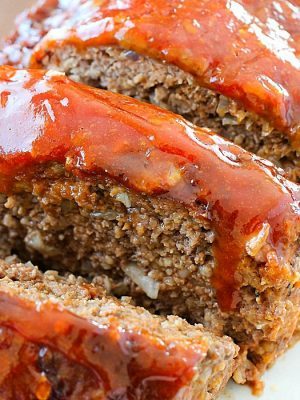 This Meatloaf Recipe is my family's FAVORITE Sunday night dinner! It really is the Best Ever Meatloaf, and it is incredibly easy to make. So much flavor packed inside with a delicious glaze spread on the top!