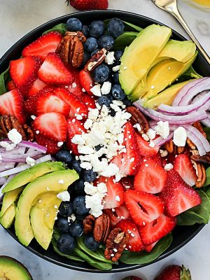 This Spinach Salad Recipe with blow your mind! It's super easy to throw together and has so much flavor!