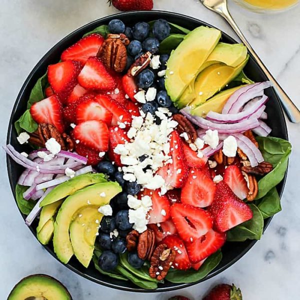 This Spinach Salad Recipe with blow your mind! It's super easy to throw together and has so much flavor!