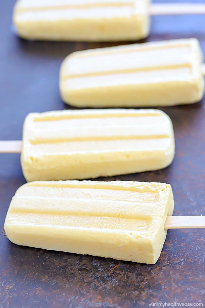 Making homemade popsicles is so easy! These Tropical Protein Popsicles are filled with protein and taste like a tropical vacation! YUM! #AD