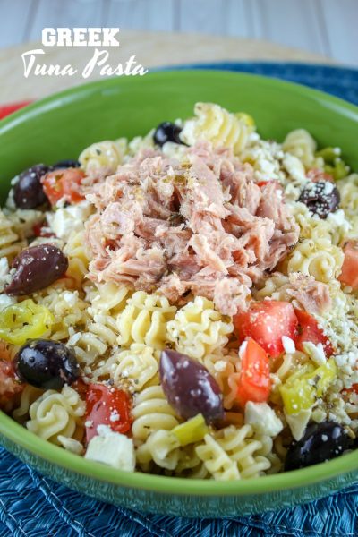 Green bowl filled with Tuna Greek Pasta Salad.
