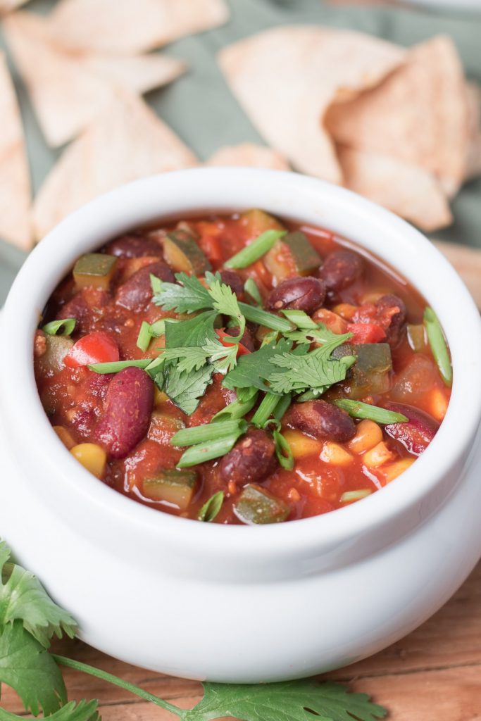 White small bowl of veggie chili.