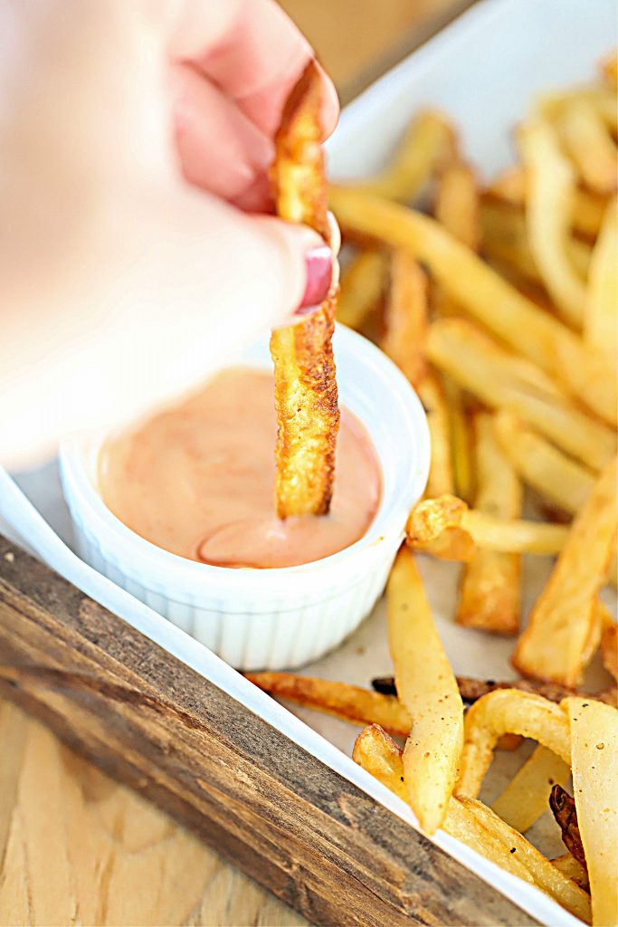 French fry dipped in fry sauce